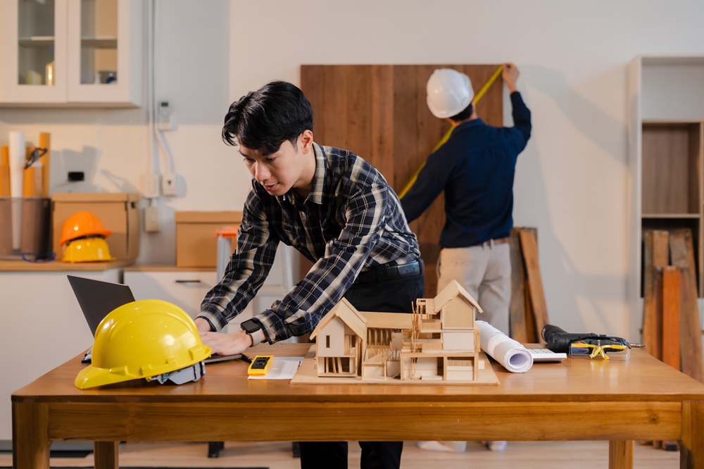 Team architect or engineer in office working on architects project.